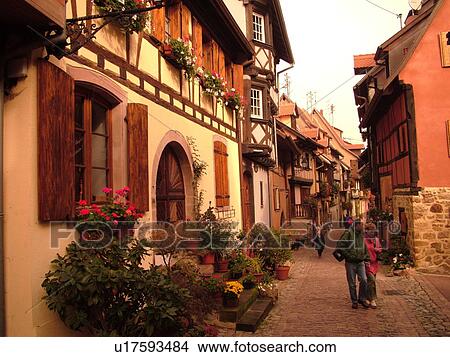 France, Europe, Alsace, Eguisheim, Haut-Rhin, L'Alsace Wine Region, Route du Vin, picturesque village, half-timbered buildings, narrow cobblestone pedestrian street View Large Photo Image Picture - France, Europe, Alsace, Eguisheim, Haut-Rhin, L'Alsace Wine Region, Route du Vin, picturesque village, half-timbered buildings, narrow cobblestone pedestrian street. Fotosearch