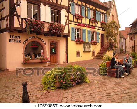 France, Europe, Alsace, Eguisheim, Haut-Rhin, L'Alsace Wine Region, Route du Vin, downtown, Vins Fins D'Alsace, wine shop, half-timbered buildings View Large Photo Image Stock Photo - France, Europe, Alsace, Eguisheim, Haut-Rhin, L'Alsace Wine Region, Route du Vin, downtown, Vins Fins D'Alsace, wine shop, half-timbered buildings. Fotosearch
