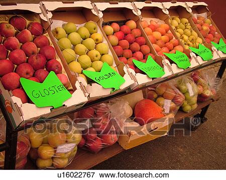 Stock Photo -  France, Europe, Alsace, Mittelwihr, Haut-Rhin, L'Alsace Wine Region, Route du Vin, farmers market, Gloster, Golden, Idared, Suisse Orange, Nashi, Melrose apples. Fotosearch