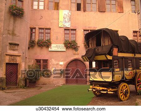 France, Europe, Alsace, Riquewihr, Haut-Rhin, L'Alsace Wine Region, Route du Vin, Musee de la Communication En Alsace, downtown, antique carriage View Large Photo Image Picture - France, Europe, Alsace, Riquewihr, Haut-Rhin, L'Alsace Wine Region, Route du Vin, Musee de la Communication En Alsace, downtown, antique carriage. Fotosearch