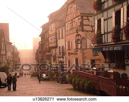 France, Europe, Alsace, Riquewihr, Haut-Rhin, L'Alsace Wine Region, Route du Vin, downtown, half-timbered buildings, cobblestone street, fog View Large Photo Image Stock Image - France, Europe, Alsace, Riquewihr, Haut-Rhin, L'Alsace Wine Region, Route du Vin, downtown, half-timbered buildings, cobblestone street, fog. Fotosearch
