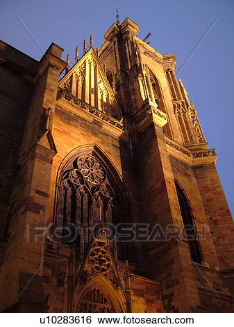 Stock Photograph -  France, Europe, Collegiale Saint Martin, Alsace, Colmar, Haut-Rhin, L'Alsace Wine Region, Route du Vin, downtown, evening, gothic, 13th and 14th century, cathedral. Fotosearch