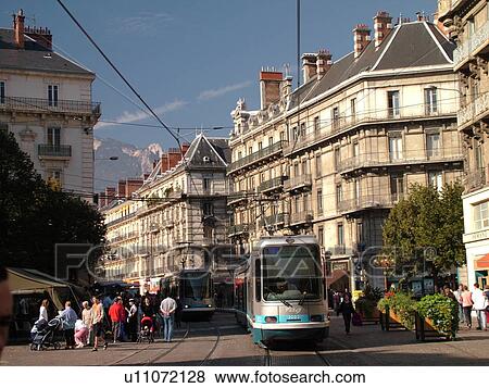 Stock Photo -  France, Grenoble, Isere, Rhone-Alpes, Europe, downtown, tram, trolley. Fotosearch