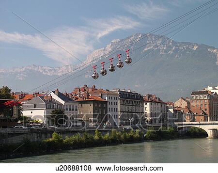 Stock Photo -  France, Grenoble, Isere, Rhone-Alpes, Europe, Telepherique de la Bastille, gondola, Isere River. Fotosearch