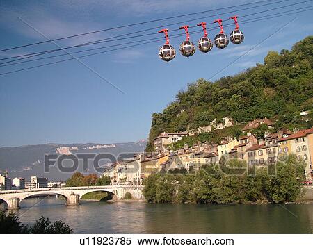 Stock Photography -  France, Grenoble, Isere, Rhone-Alpes, Europe, Telepherique de la Bastille, gondola, Isere River. Fotosearch