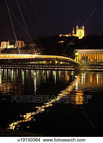France, Lyon, Rhone-Alpes, Europe, Palais de Justice, Saone River, Basilique Notre-Dame de Fourviere, pedestrian bridge, evening, illuminated View Large Photo Image Picture - France, Lyon, Rhone-Alpes, Europe, Palais de Justice, Saone River, Basilique Notre-Dame de Fourviere, pedestrian bridge, evening, illuminated. Fotosearch