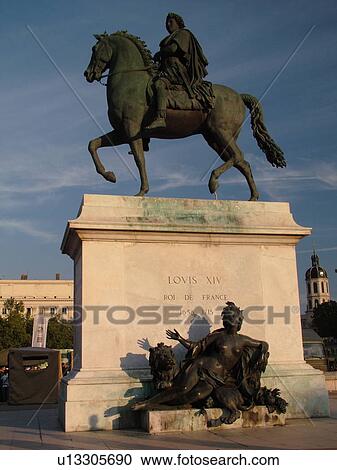 Stock Image -  France, Lyon, Rhone-Alpes, Europe, Equestrian statue of Louis XIV, Place Bellecour. Fotosearch