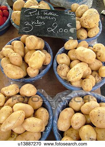 Stock Image -  France, Lyon, Rhone-Alpes, Europe, downtown, City Market, potatoes. Fotosearch