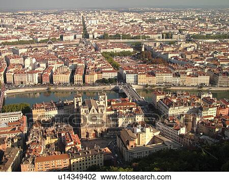 Stock Image -  France, Lyon, Rhone-Alpes, Europe, Saone River, Rhone River, Presqu'ile, aerial view of downtown Lyon from Fourviere Hill, Cathedrale St Jean . Fotosearch