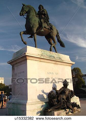 Stock Image -  France, Lyon, Rhone-Alpes, Europe, Equestrian statue of Louis XIV, Place Bellecour. Fotosearch