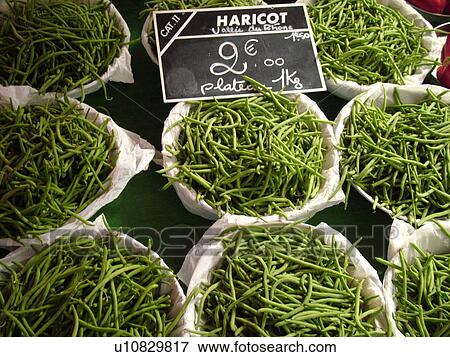 Stock Photo -  France, Lyon, Rhone-Alpes, Europe, downtown, City Market, green beans. Fotosearch