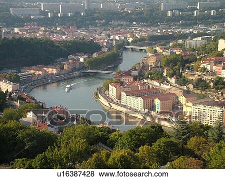 Stock Photo -  France, Lyon, Rhone-Alpes, Europe, Saone River, aerial view of downtown Lyon from Fourviere Hill. Fotosearch