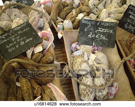 Stock Photo -  France, Lyon, Rhone-Alpes, Europe, downtown, City Market, saucissons. Fotosearch