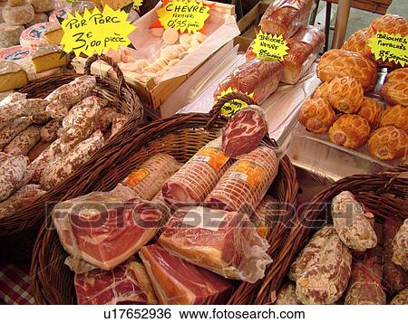 Stock Photograph -  France, Lyon, Rhone-Alpes, Europe, downtown, City Market, meats, cheeses. Fotosearch
