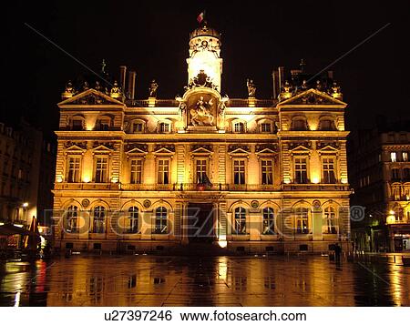 Stock Photograph -  France, Lyon, Rhone-Alpes, Europe, downtown, City Hall, Hotel de Ville, Place des Terreaux, evening, illuminated. Fotosearch