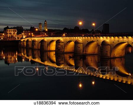 Picture -  France, Macon, Burgundy, Saone et Loire, Europe, Saone River, The 11th century Pont de St-Laurent, evening. Fotosearch
