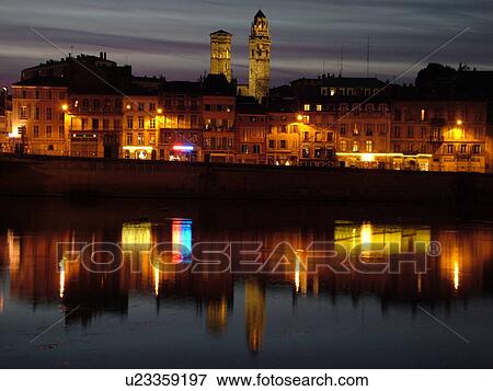 Stock Photo -  France, Macon, Burgundy, Saone et Loire, Europe, Saone River, evening, reflection. Fotosearch