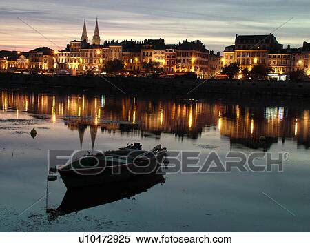 Stock Photography -  France, Macon, Burgundy, Saone et Loire, Europe, Saone River, evening, reflection. Fotosearch