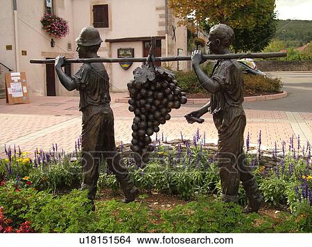 France, Marsannay la Cote, Burgundy, Cote de Nuits, Cote d'Or, Europe, Burgundy Wine Region, wine harvest statue, men carrying grapes View Large Photo Image Picture - France, Marsannay la Cote, Burgundy, Cote de Nuits, Cote d'Or, Europe, Burgundy Wine Region, wine harvest statue, men carrying grapes. Fotosearch