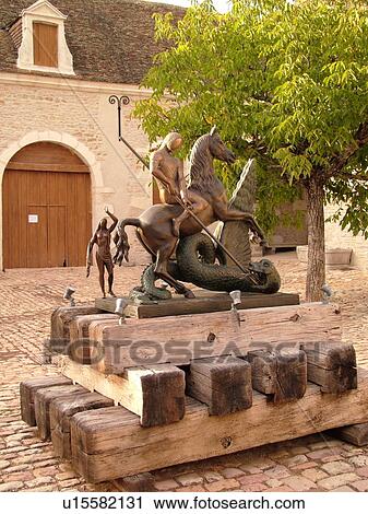 Stock Image -  France, Pommard, Burgundy, Cote de Beaune, Cote d'Or, Europe, Burgundy Wine Region, Chateau de Pommard, sculpture. Fotosearch
