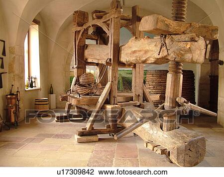 Stock Image -  France, Pommard, Burgundy, Cote de Beaune, Cote d'Or, Europe, Burgundy Wine Region, Chateau de Pommard, wine press. Fotosearch
