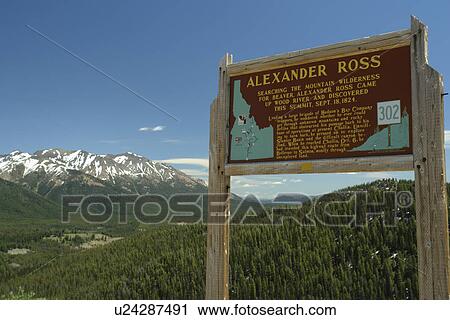 Stock Image -  Galena, ID, Idaho, Sawtooth National Recreation Area, Sawtooth National Forest, Galena Mountain Pass Road, Alexander Ross wooden road sign, historical marker. Fotosearch