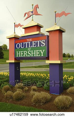 Stock Photo -  Hershey, PA, Pennsylvania, The Outlets at Hershey, entrance sign. Fotosearch