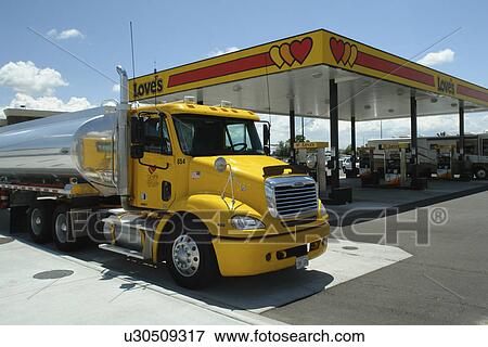 Heyburn, ID, Idaho, I-84, gas station, yellow Freightliner cab, truck, 18-wheeler, tanker View Large Photo Image Stock Photo - Heyburn, ID, Idaho, I-84, gas station, yellow Freightliner cab, truck, 18-wheeler, tanker. Fotosearch
