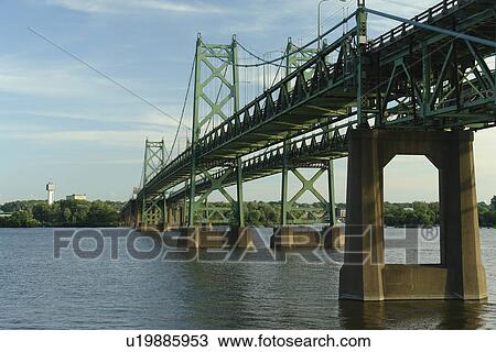 Stock Image -  IA, Iowa, IL, Illinois, Mississippi River, Iowa-Illinois Memorial Bridge, I-74 Bridge. Fotosearch