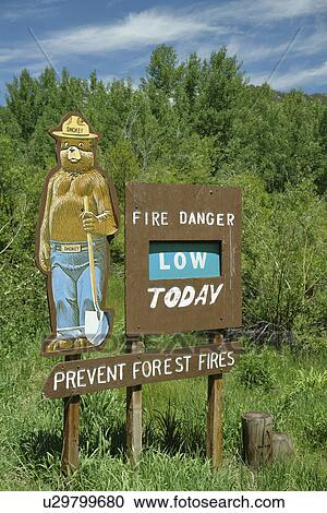 Stock Image -  ID, Idaho, Sawtooth National Recreation Area, Sawtooth National Forest, Rt. 75, scenic route, byway, fire danger sign, Smokey the Bear. Fotosearch