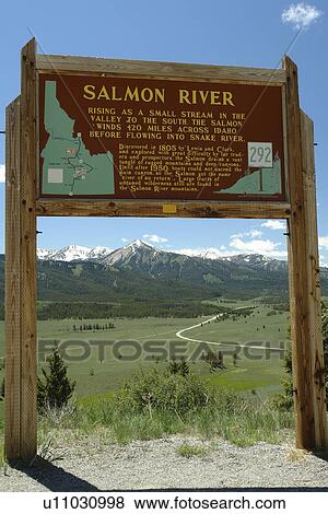 Stock Photo -  ID, Idaho, Sawtooth National Recreation Area, Sawtooth National Forest, Galena Overlook, Sawtooth Valley and Salmon River, Salmon River wooden road sign, historical marker. Fotosearch