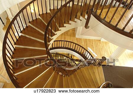 Stock Image -  Iowa City, IA, Old Capitol building, National Historic Landmark, University of Iowa, reverse spiral staircase. Fotosearch