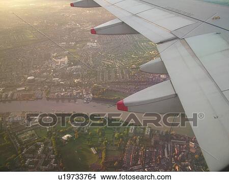 Picture -  London, Great Britain, England, Europe, United Kingdom, aerial view of London, British Airways plane, airlines. Fotosearch
