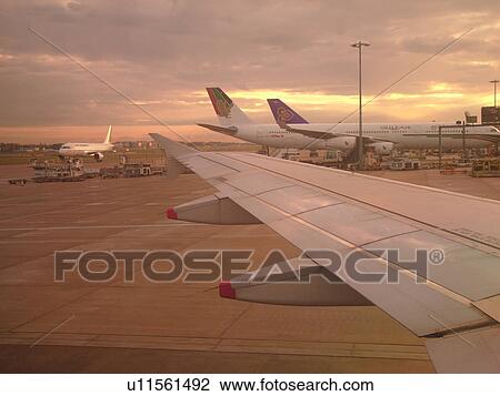 Stock Image -  London, Great Britain, England, Europe, United Kingdom, Heathrow International Airport, airport terminal, British Airways plane, airlines. Fotosearch