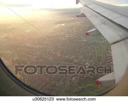 Stock Image -  London, Great Britain, England, Europe, United Kingdom, aerial view of London, British Airways plane, airlines. Fotosearch