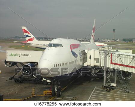 Stock Photography -  London, Great Britain, England, Europe, United Kingdom, Heathrow International Airport, airport terminal, gate, British Airways plane, airlines. Fotosearch