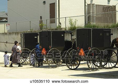Millersburg, Holmes County, OH, Ohio, Amish buggies, Amish women and children, parking lot View Large Photo Image Stock Image - Millersburg, Holmes County, OH, Ohio, Amish buggies, Amish women and children, parking lot. Fotosearch