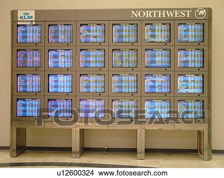 Picture -  Minneapolis, MN, Minnesota, Minneapolis International Airport, airport information, flight arrivals and departure monitors, airport terminal, hub. Fotosearch