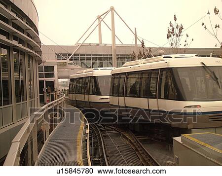 Stock Image -  Minneapolis, MN, Minnesota, Minneapolis International Airport, Tram to Terminal, train, rail system, airport terminal, hub. Fotosearch