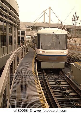 Stock Image -  Minneapolis, MN, Minnesota, Minneapolis International Airport, Tram to Terminal, train, rail system, airport terminal, hub. Fotosearch