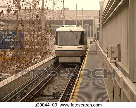 Minneapolis, MN, Minnesota, Minneapolis International Airport, Tram to Terminal, train, rail system, airport terminal, hub View Large Photo Image Stock Photo - Minneapolis, MN, Minnesota, Minneapolis International Airport, Tram to Terminal, train, rail system, airport terminal, hub. Fotosearch