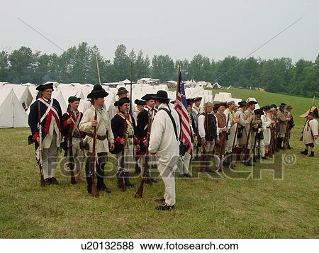 Stock Photo -  Mt. Independence, VT, Vermont, Revolutionary War Reenactment, soldiers dressed authentic uniforms. Fotosearch
