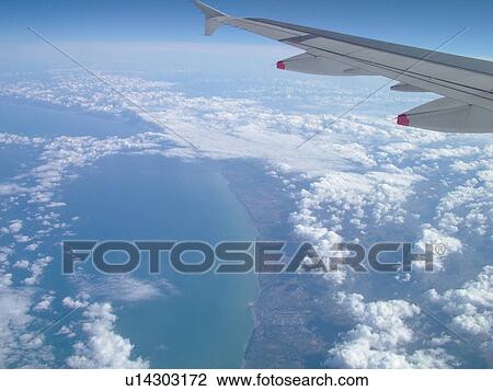 Normandy, France, Europe, aerial, flying over the coast of Normandy, English Channel, British Airways plane, wing View Large Photo Image Stock Image - Normandy, France, Europe, aerial, flying over the coast of Normandy, English Channel, British Airways plane, wing. Fotosearch