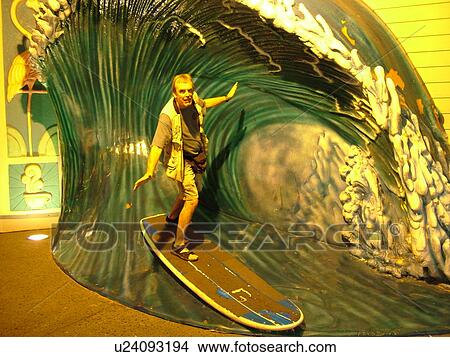 Orlando, FL, Florida, Universal Orlando Resort, Universal City Walk, evening, man on surfboard display at surfing attraction View Large Photo Image Picture - Orlando, FL, Florida, Universal Orlando Resort, Universal City Walk, evening, man on surfboard display at surfing attraction. Fotosearch
