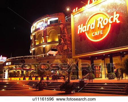 Stock Photograph -  Orlando, FL, Florida, Universal Orlando Resort, Universal City Walk, Hard Rock CafT, Orlando Ballet, evening. Fotosearch