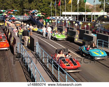 Picture -  Orlando, FL, Florida, Walt Disney World Resort, Magic Kingdom Park, Tomorrowland, Tomorrowland Indy Speedway (Editorial Use Only). Fotosearch