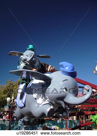 Stock Image -  Orlando, FL, Florida, Walt Disney World Resort, Magic Kingdom Park, Dumbo The Flying Elephant Ride, carousel (Editorial Use Only). Fotosearch