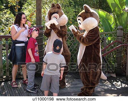 Orlando, FL, Florida, Walt Disney World Resort, Magic Kingdom Park, Adventureland, Chip & Dale, chipmunks, signing autographs for kids (Editorial Use Only) View Large Photo Image Stock Photo - Orlando, FL, Florida, Walt Disney World Resort, Magic Kingdom Park, Adventureland, Chip & Dale, chipmunks, signing autographs for kids (Editorial Use Only). Fotosearch