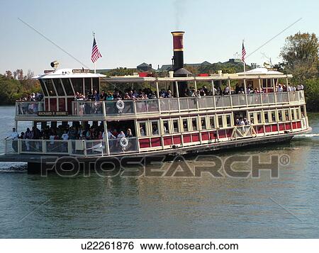 Stock Photograph -  Orlando, FL, Florida, Walt Disney World Resort, Magic Kingdom Park, Seven Seas Lagoon, Ferryboat, Steamboat (Editorial Use Only). Fotosearch