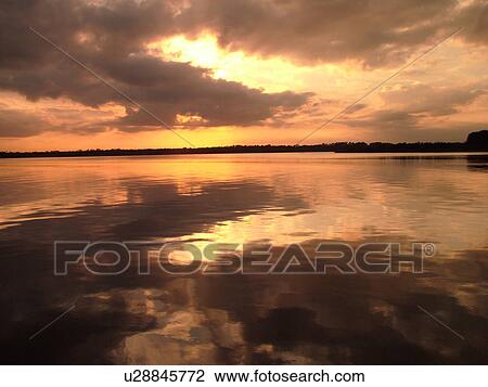 Stock Image -  Palm Coast, FL, Florida, intracoastal waterway, sunset. Fotosearch